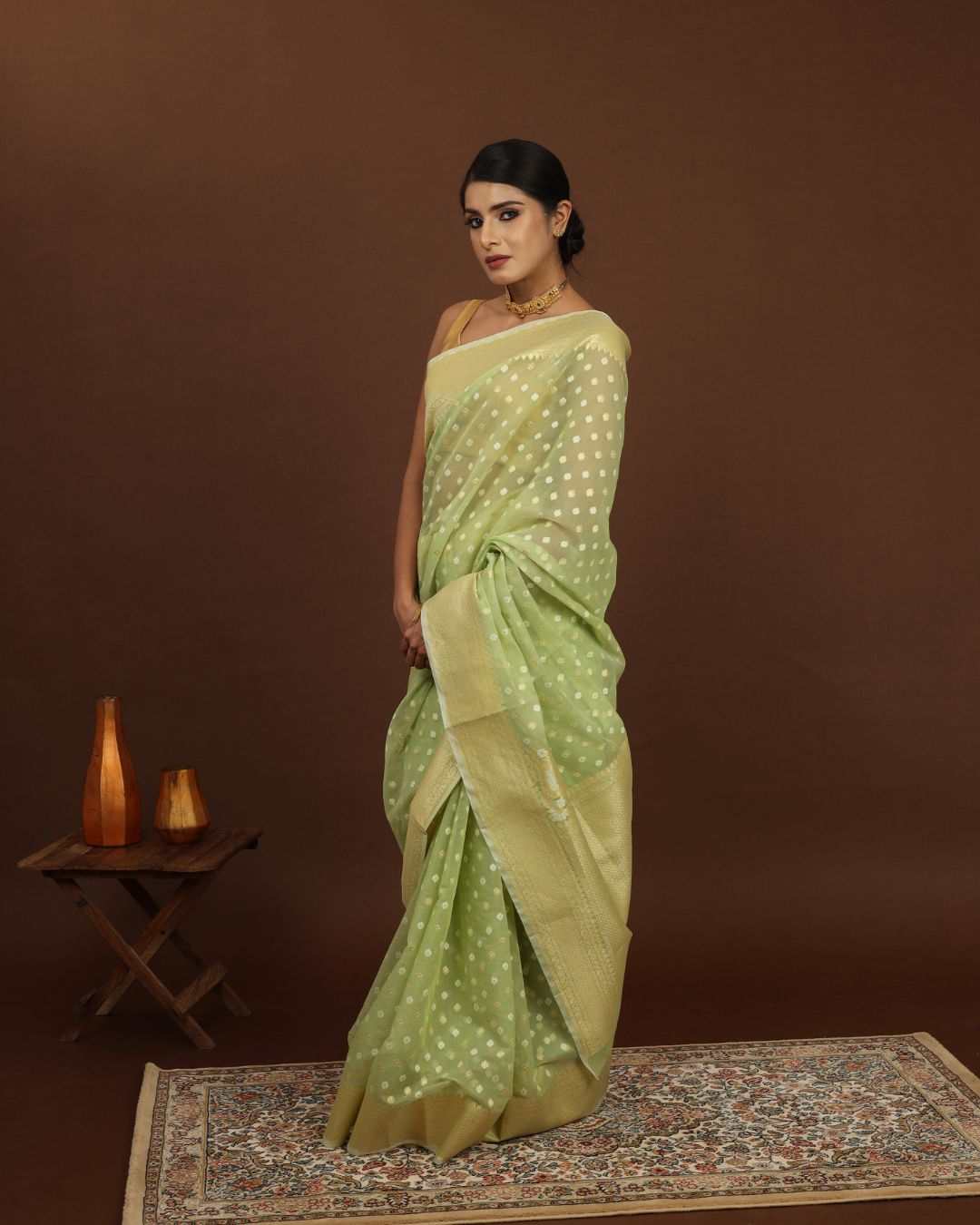 Auric Whisper Banarasi Jamdani bottle green saree with golden zari handwoven cotton silk