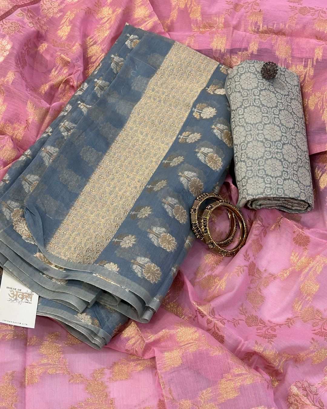 Elegant greyish blue Banarasi silk suit with carrot pink dupatta and brocade bottom, hand-loomed luxury fabric.