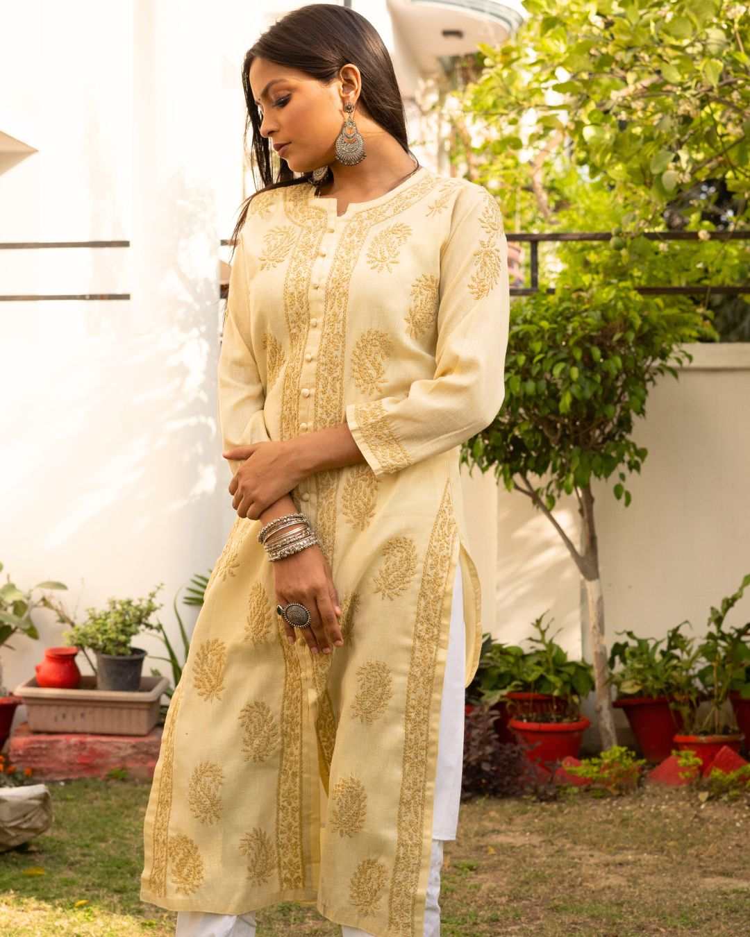 Brown cotton Chikan kurta for women with hand-embroidered design, perfect casual and college wear