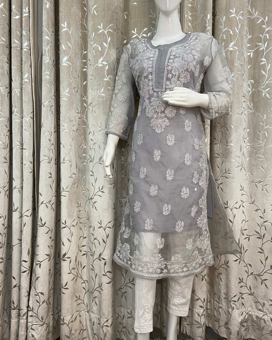 Elegant women's organza Lucknowi Chikankari kurta with intricate embroidery in pastel shade