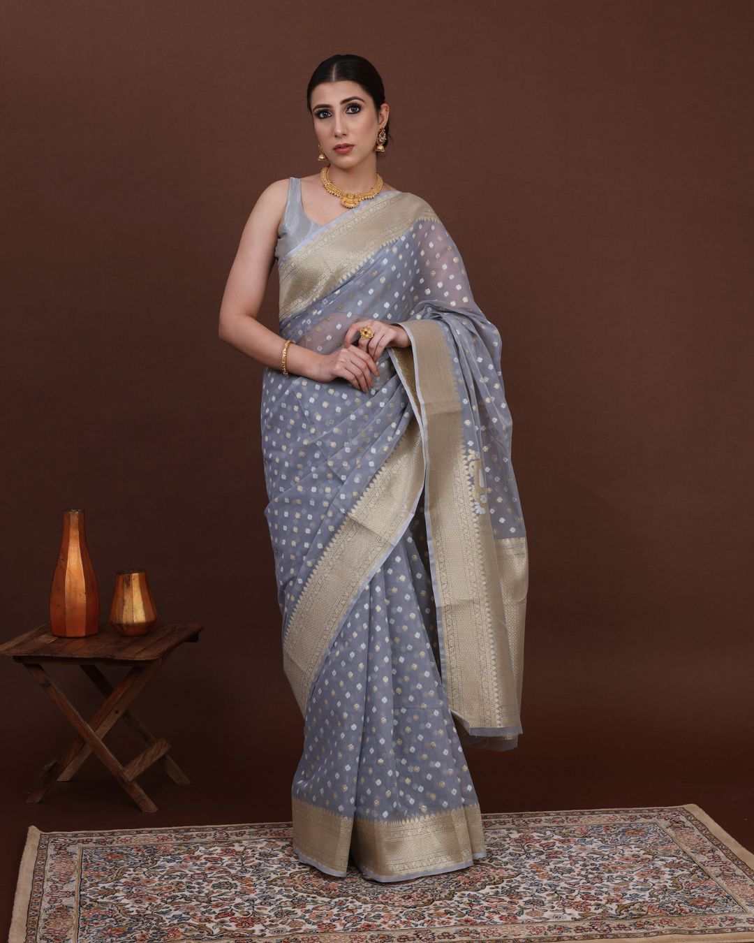 Pearl Sky Jamdani Cotton Silk Saree with Banarasi silk and golden zari threads draped elegantly