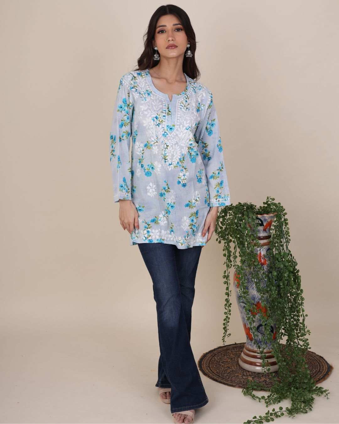 Women wearing Phool Blue Short Chikan Kurta in mulmul cotton with full sleeves and traditional chikankari pattern