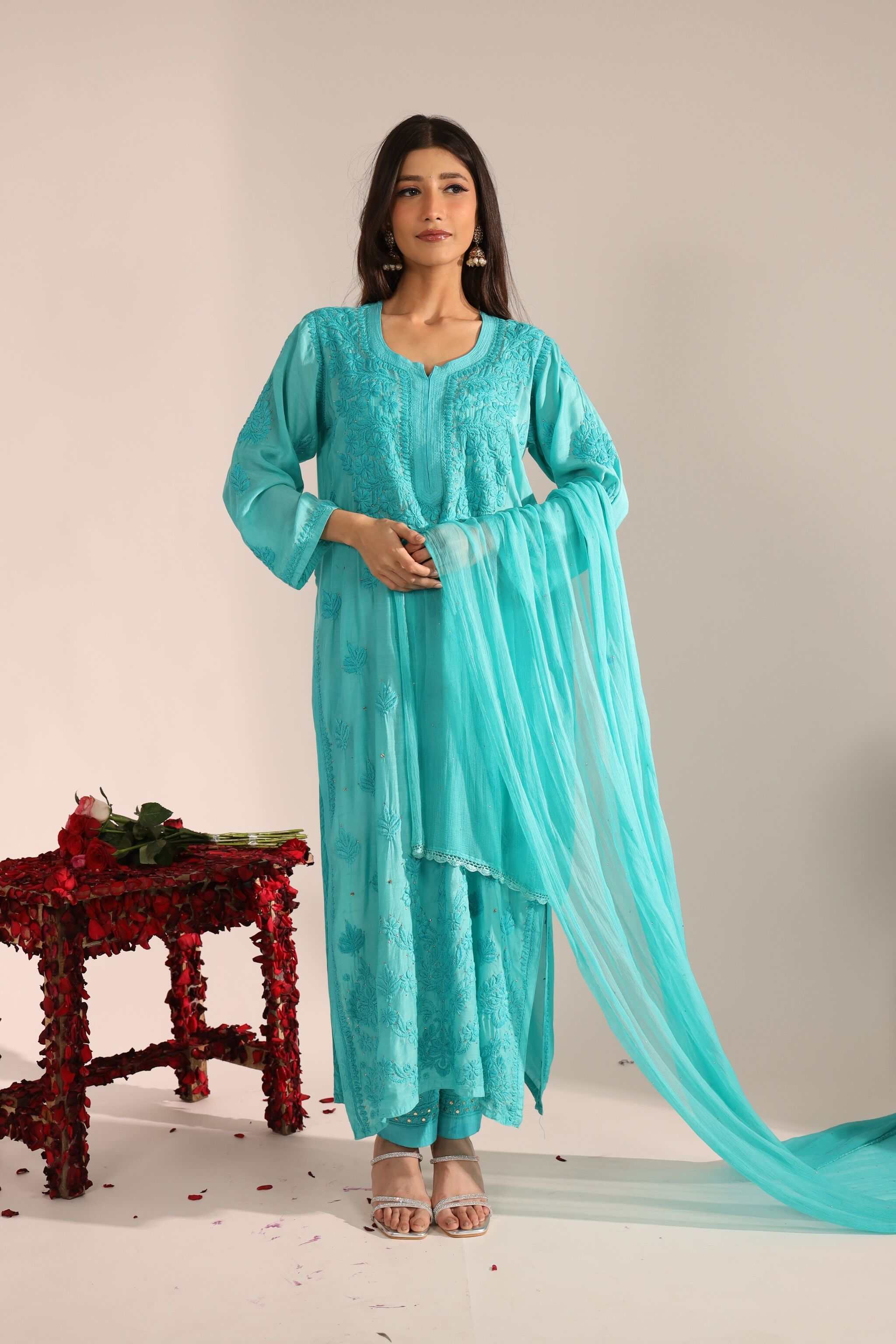 Front view of model wearing sea green Sitara Mayra Kurta Set with dupatta and palazzo pants.