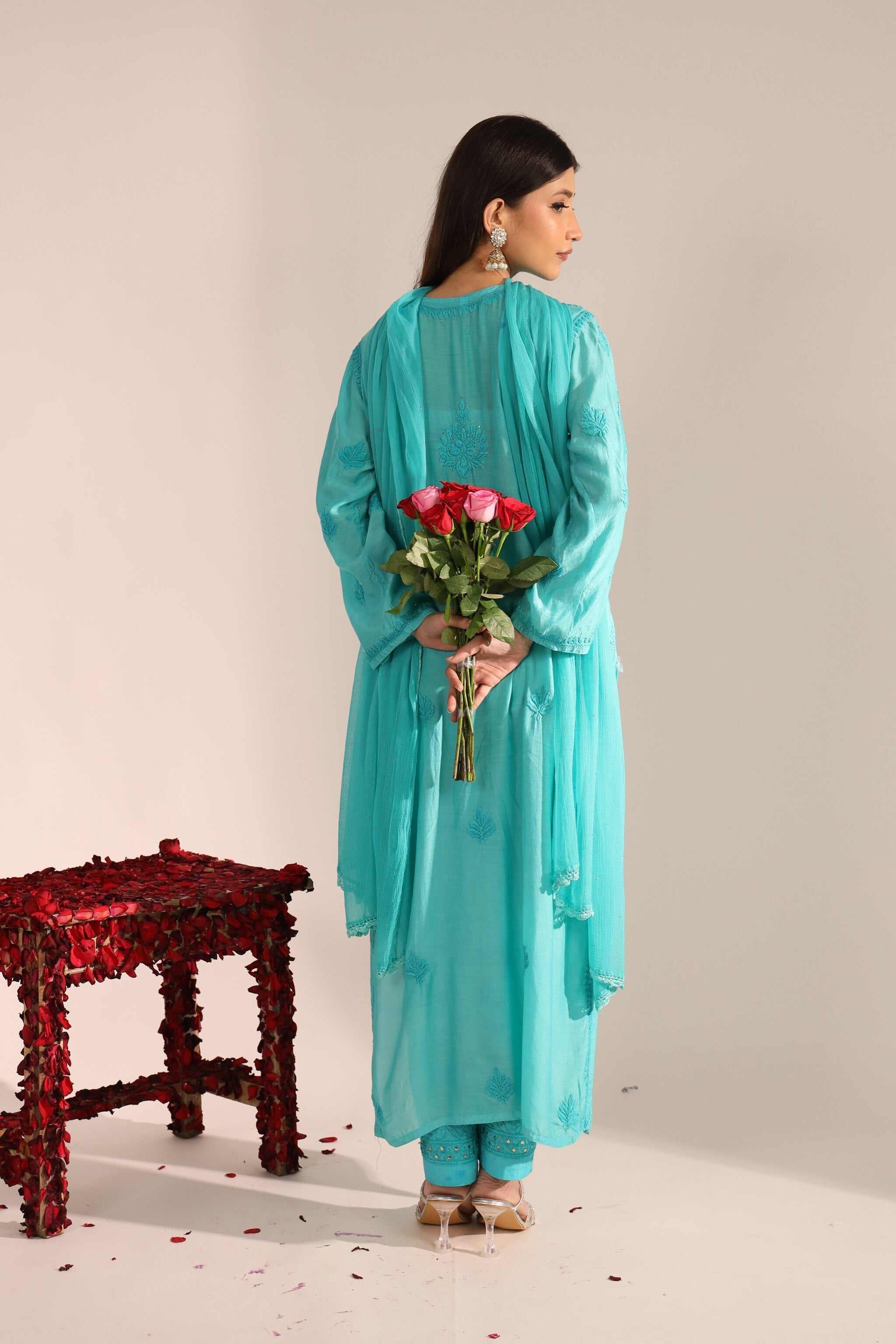Back view of the kurta showing soft muslin fabric and flowy silhouette.