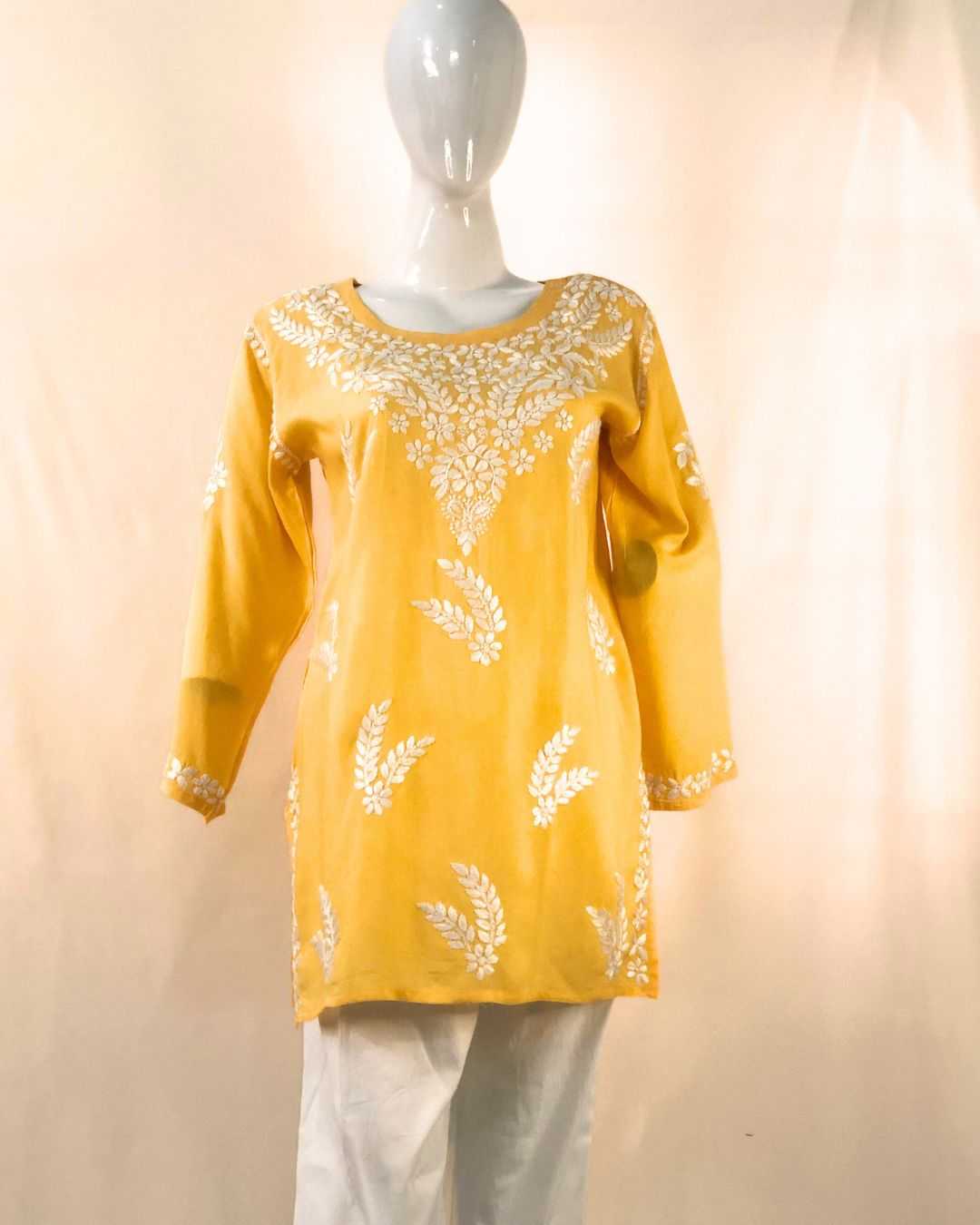 Yellow Short Chikankari Kurti for women in modal cotton fabric with elegant embroidery