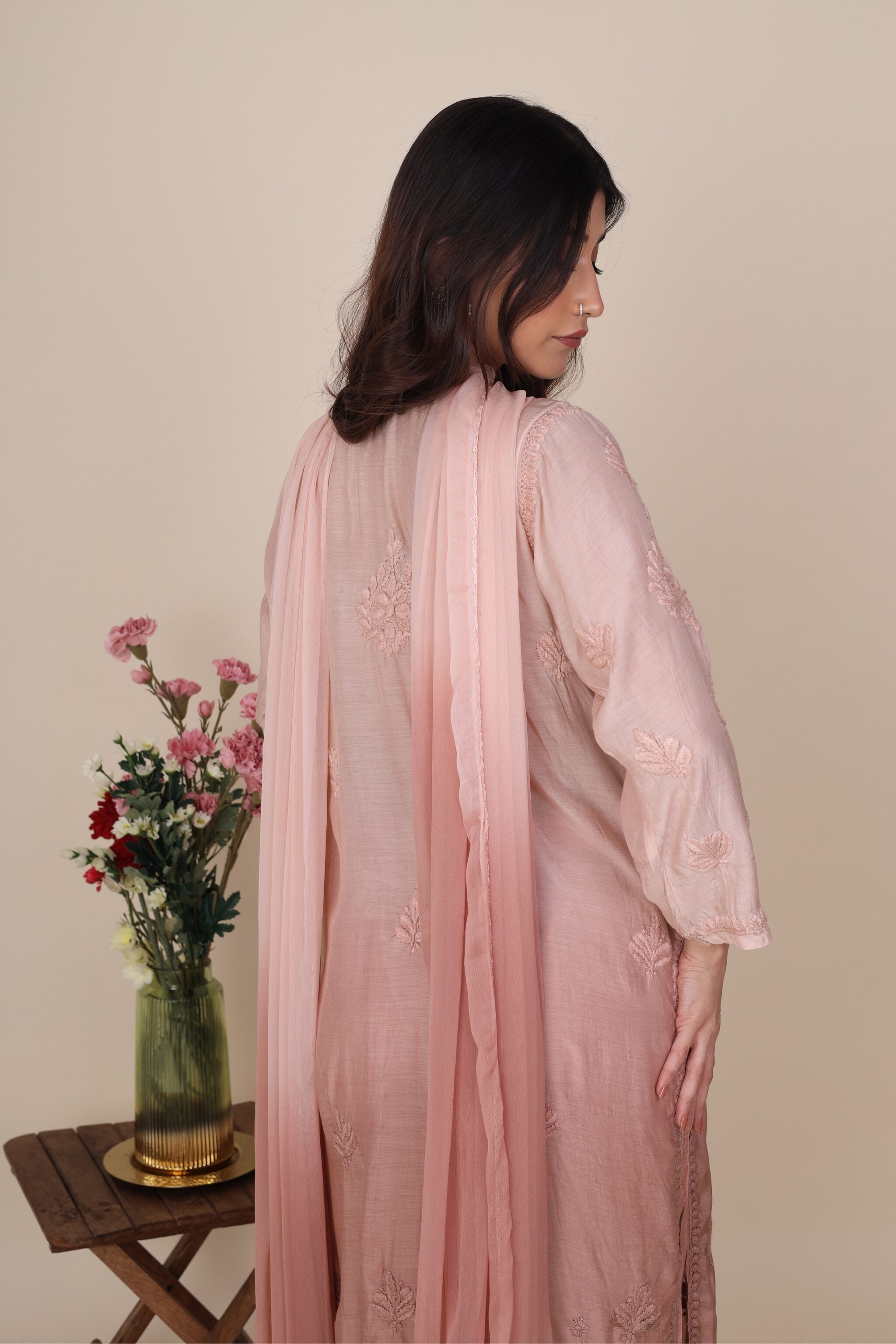 Back view of the Gauhar chikankari kurta showcasing elegant embroidery and soft fabric drape